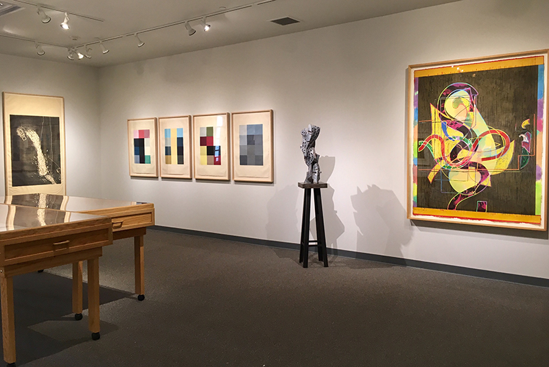 framed artwork and a statue