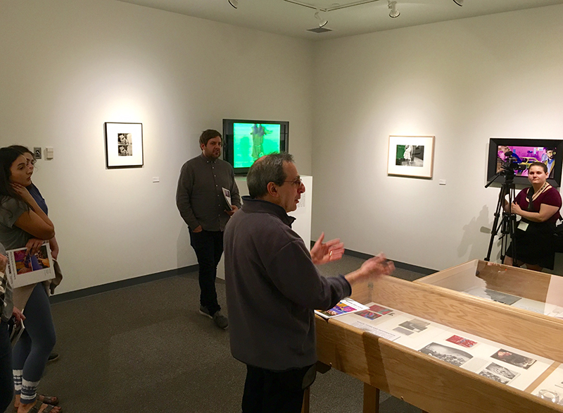 professor giving gallery talk in gallery