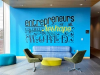 blue mural that says entrepreneurs of all kinds reshape our world From Classroom to Boardroom: How Marywood’s Business Programs Shape Tomorrow’s Leaders