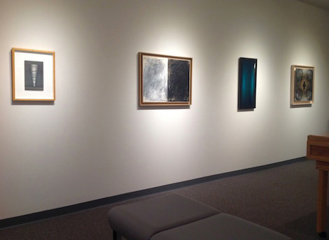 framed work on wall