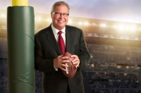 A man holding a football near a goal post Former NFL QB/Analyst Ron Jaworski Will Speak at Marywood’s Commencement