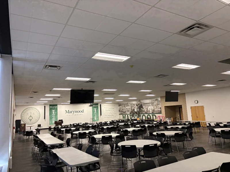 An empty view of the wooden floors in the Latour Conference room